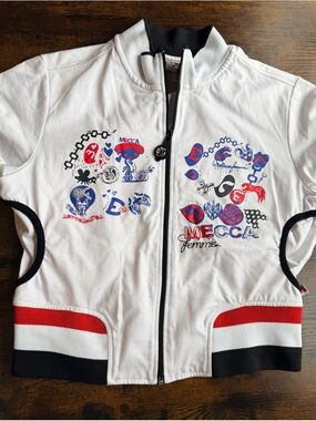Mecca Femme zip-up top.  Red, white, blue and black.  Great graphics!